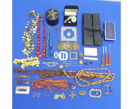 A quantity of Costume Jewellery, including a Launer &amp; Co., leather jewellery wrap, vintage white paste, bead necklaces et