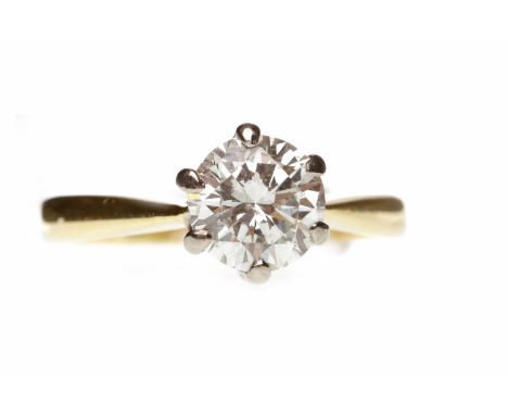 EIGHTEEN CARAT GOLD DIAMOND SOLITAIRE RING
with a six claw set round brilliant cut diamond of approximately 1.10 carats, size