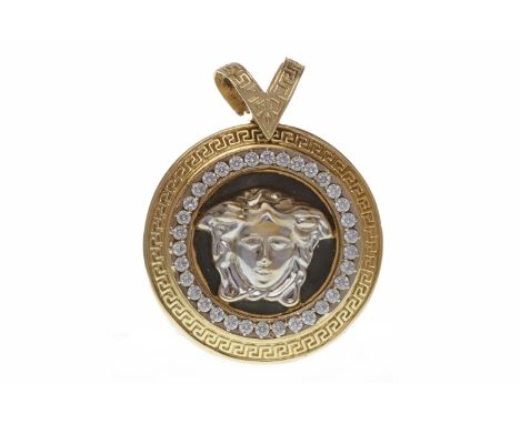 LARGE FOURTEEN CARAT GOLD MEDUSA PENDANT
with a central black enamel section with applied Medusa head emblem, surrounded by r