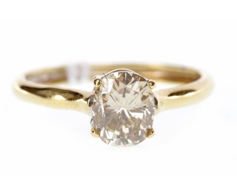 EIGHTEEN CARAT GOLD DIAMOND SOLITAIRE RING
set with an oval stone of approximately 1.22 carats, with cognac tones, size N, 2.