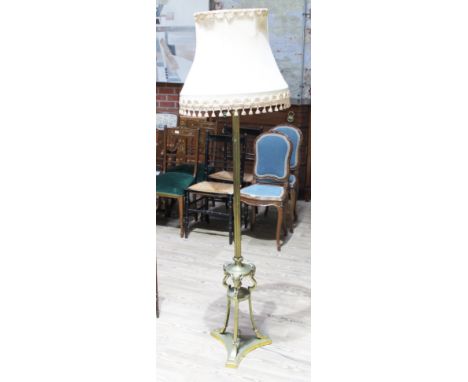 An Empire styleadjustable brass lamp standard.