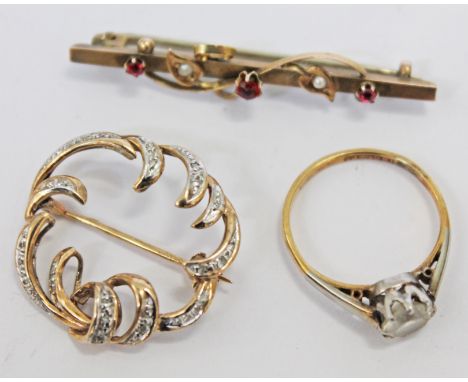 A mixed lot comprising a hallmarked 9ct gold brooch set with seed pearls and ruby coloured stones, another brooch marked '9CT