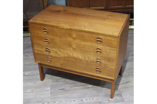 A Danish Style Teak Chest Of Drawers With Buearu Bookcase Top