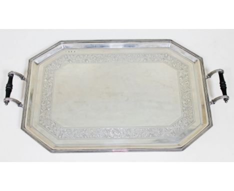 A Victorian Aesthetic silver tray of octagonal form, bright cut engraved border with acorns and leaves, fluted rim, turned eb