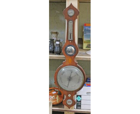 A Georgian mahogany barometer.