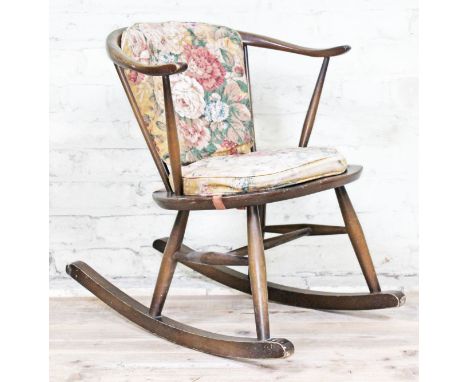 An Ercol dark elm and beech rocking chair, width 61cm, depth 70cm & height 66cm.