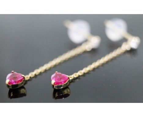 A pair of diamond and ruby drop earrings, marked 'K18', length 25mm each, gross wt. 0.4g.