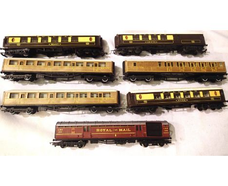 Seven OO scale coaches including three LNER Teak, three Pullman and T.P.O, in mostly good condition, unboxed. P&amp;P Group 1