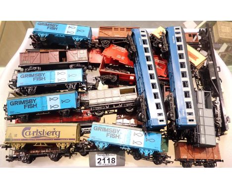 Approximately thirty OO scale wagons, various makes and types mostly in good condition, unboxed. Plus two Lima H.O scale blue