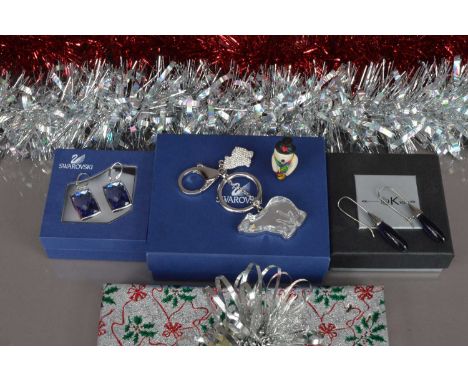 A modern Swarovski Polar Bear key chain in box, together with a pair of Swarovski crystal earrings, a pair of OK Silver drop 