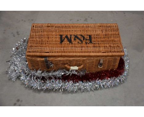 An early 21st century wicker hamper from Fortnum & Mason
