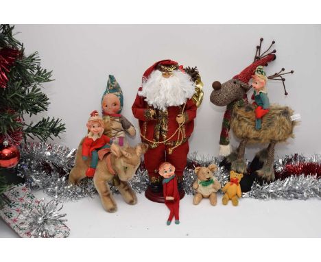 A group of vintage and modern Christmas related toys and soft toys, including three naughty Celuloid headed elves, probably J