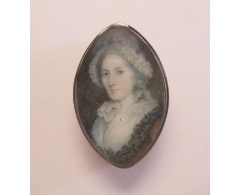 19th Century double sided oval portrait miniatures of a lady and gentlemanOverall size about 30 x 20mm 