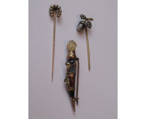 Gold stick pin in the form of an acorn set old cut diamonds and a grey pearl, together with a Victorian gold pearl inset stic