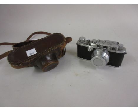 Leica 35mm roll film camera, marked Leica DRP Ernst Leitz Wetzlar No. 212768, in original leather caseAppears to be in reason