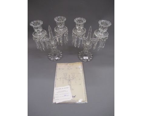 Pair of Baccarat glass twin light candelabra with prismatic glass drops, 12.75ins high 