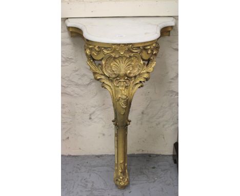 Small 19th Century gilded composition console table, the shaped marble top above a single cabriole support with acanthus capi