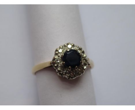 18ct Yellow gold circular sapphire and diamond cluster ring 