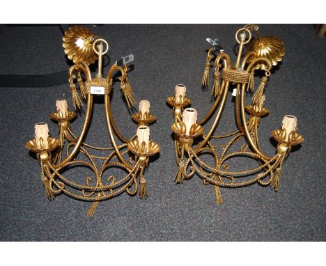 Pair of Christopher Wray gilt metal four light electroliers of scroll rope and swag design, 22ins high excluding ceiling rose
