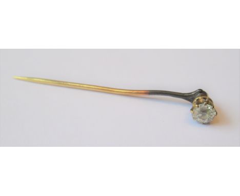 Yellow metal solitaire diamond stick pin of approximately 0.2ct 