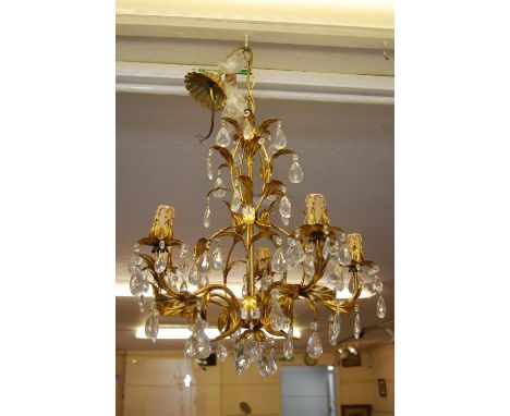 Christopher Wray gilt metal and crystal glass five light electrolier of scroll and foliate design, 22ins high excluding chain