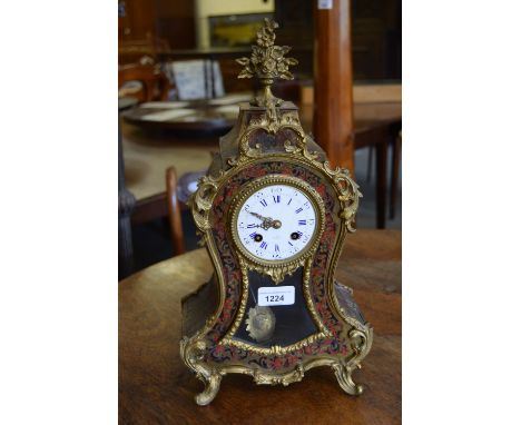 19th Century French buhl work mantel clock having gilt metal mounts with circular enamel dial (at fault), with two train move