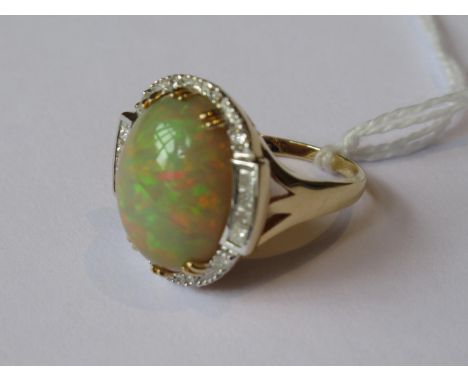 Large 18ct yellow gold opal and diamond ring, 10.2g, the opal 17mm x 14mmRing size O 