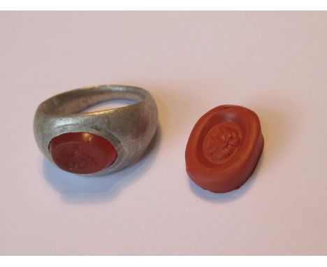 Roman silver ring with intaglio seal, together with wax casting of sealIntaglio approx. 13mm x 8mmRing overall approx. 24mm x