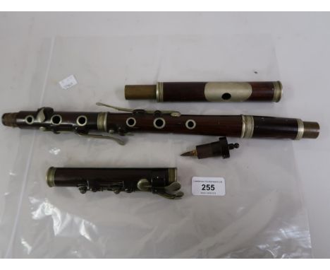 Early 20th Century rosewood and nickel plate mounted flute (at fault)The overall length is 25insThe flute cannot be fully ass