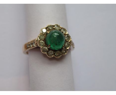 Yellow metal circular cluster ring set cabochon emerald and diamondsGood overall condition. Not hallmarked. Emerald is 6mm. T