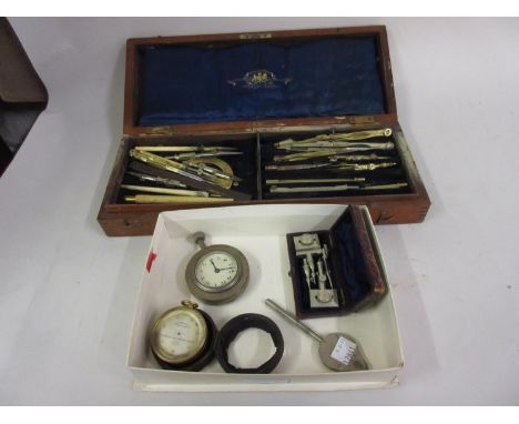 Case containing a quantity of late 19th / early 20th Century drawing instruments together with a pocket barometer (at fault),