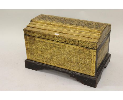 20th Century oriental black lacquer gilt decorated trunk with stepped hinged cover, 29ins wide approximately 