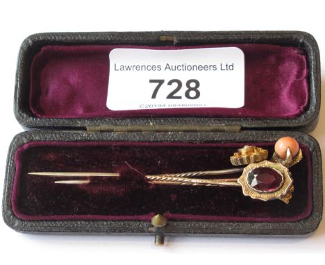 Group of four various 19th Century gold stick pins 