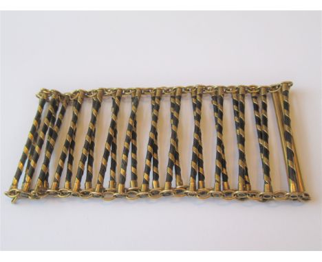 Unusual yellow metal mounted bracelet of ladder designOverall in good condition. No visible damage or repair. The two yellow 