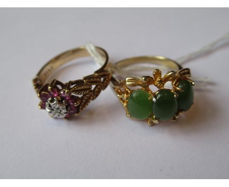 Gold dress ring set three oval jade stones together with a 9ct gold diamond and ruby dress ringThe jade ring has a mark but i