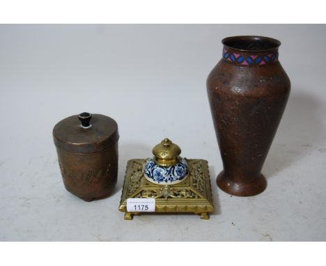 Cast brass inkwell stand with blue and white porcelain well having brass cover, circular copper box embossed with acorns, mar