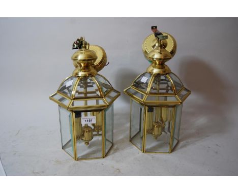 Pair of small reproduction gilt brass and bevelled glass hexagonal lantern form light fittings with dome tops, 13ins high exc