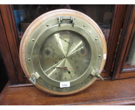 Reproduction brass marine style clock barometer, together with a pottery table lamp with shade and a modern gilt table lamp w