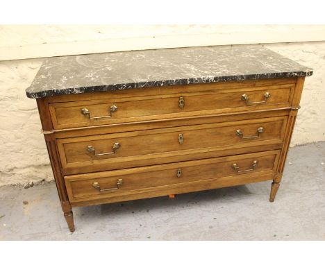 19th Century French walnut commode, the later grey variegated marble top above three graduated drawers with brass handles and