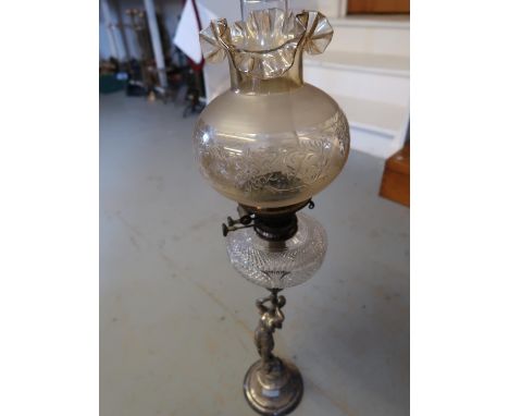 Early 20th Century silver plated oil lamp, the hobnail cut glass oil well supported by a classical maiden on circular baseFro