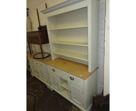 Contemporary painted dresser in 19th Century style, the moulded cornice above a boarded adjustable shelf back, the base with 