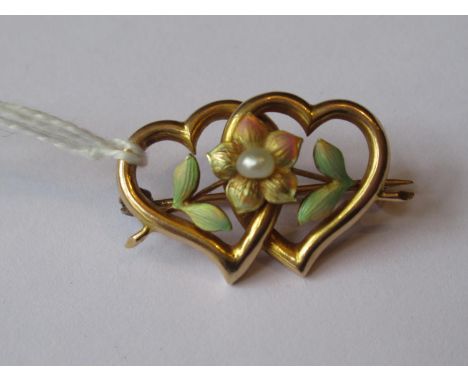 Victorian 15ct gold entwined heart brooch with enamel decorationSome losses to enamel. Clip is a little loose and needs atten