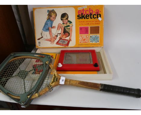 Vintage Dunlop Maxply tennis racquet together with a mid 20th Century ' Etch - a - Sketch ' in original box 