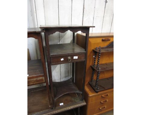 19th Century mahogany washstand having shaped top above a single shelf with single drawer and undertier, raised on square cha