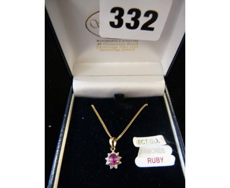 Ladies 18ct Gold Claw set Ruby Pendant with Diamond  setting on chain 3.3g total weight 