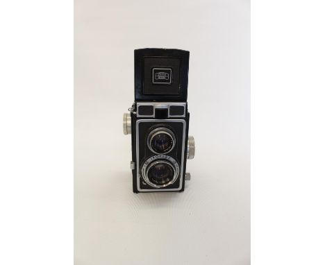 Zeiss Ikon Ikoflex twin reflex camera with brown leather fitted case marked 1249/16 