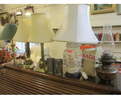 Four late 20th century table lamps, together with a Victorian oil lamp with two glass funnels, tow pewter tankards and a pewt