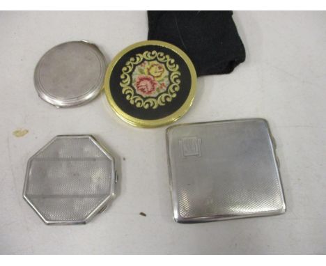 Two silver compact cases and a cigarette case 