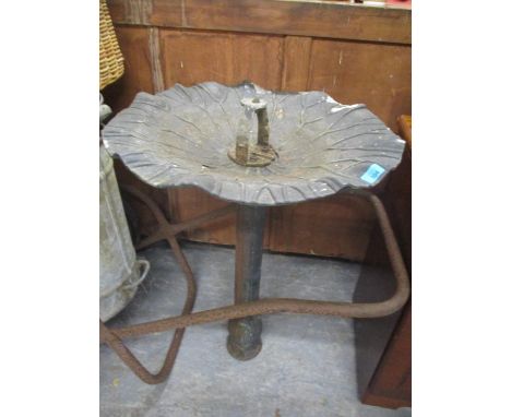 A vintage bird bath / water fountain 