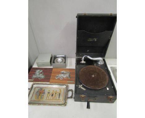 A black cased Nation Rand wind-up gramophone, a boxed Reflects world table clock, an Egyptian inlaid silver plated tray, and 